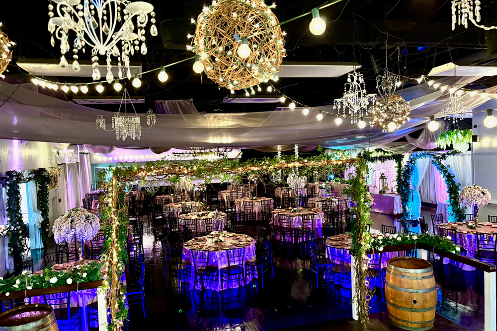 Color-coordinated uplighting enhancing walls and decor for event ambiance