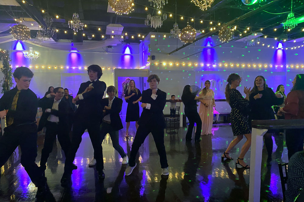 quinceanero dancers performing a choreographed dance