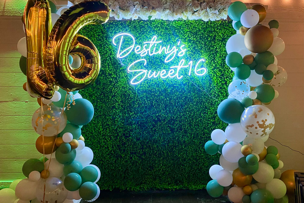 Decorated balloon photo backdrop area for guests