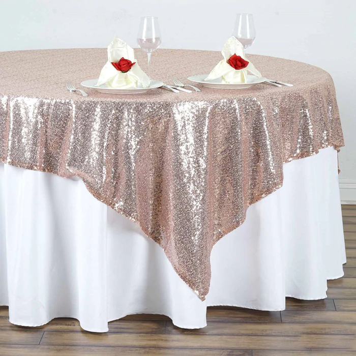 Decorative linen topper layered over guest tablecloth for an upscale event look