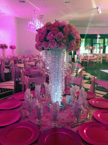 Romantic glass pink centerpiece designed for an elegant reception