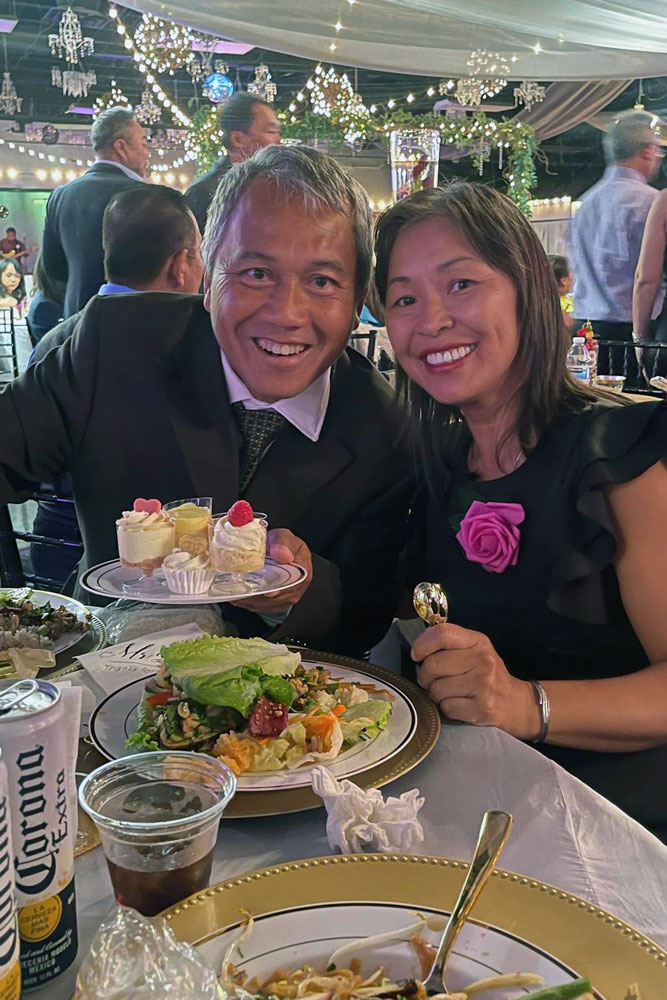 Decorated guest table with dessert being served at The Chateau at Forest Park